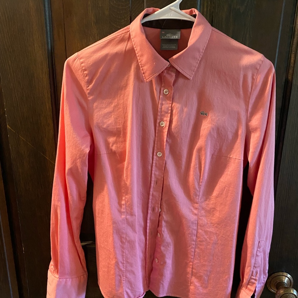 Salmon Lacoste button down shirt.